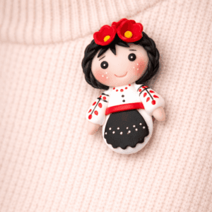 brosa-papusa-traditionala-rosu-negru-handmade-lut-polimeric-martisor-eva-art-pe-pulover