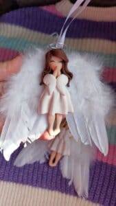ingeras cu par lung si pene glob handmade
